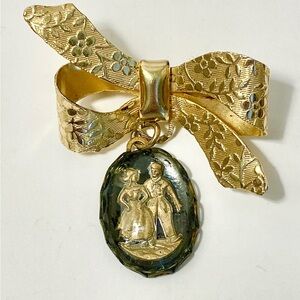 Milk maid brooch,sailor cameo courting scene.Floral bow gold tone vintage brooch